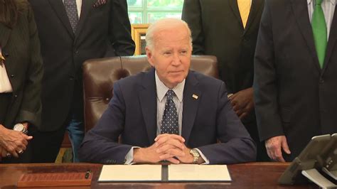 Judge orders pause on Biden program offering legal status to .